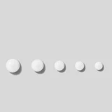 Row of white concentrate dots in decreasing sizes