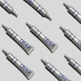 Several ELASTIderm tubes arranged diagonally on gray