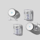 Four ELASTIderm jars, open and closed, on a gray background