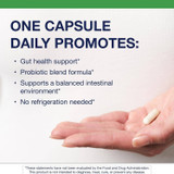 Hand holding one UltraFlora Restore capsule, one capsule daily, no refrigeration needed graphic