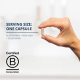 Hand holding one capsule with serving size text and B Corp logo