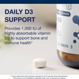 Tablet beside the bottle, daily D3 support graphic