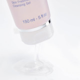 Close-up of Phytomer Rosée Visage cleansing gel tube cap with clear gel drop
