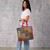 serrv upcycled sari patchwork tote on model 2