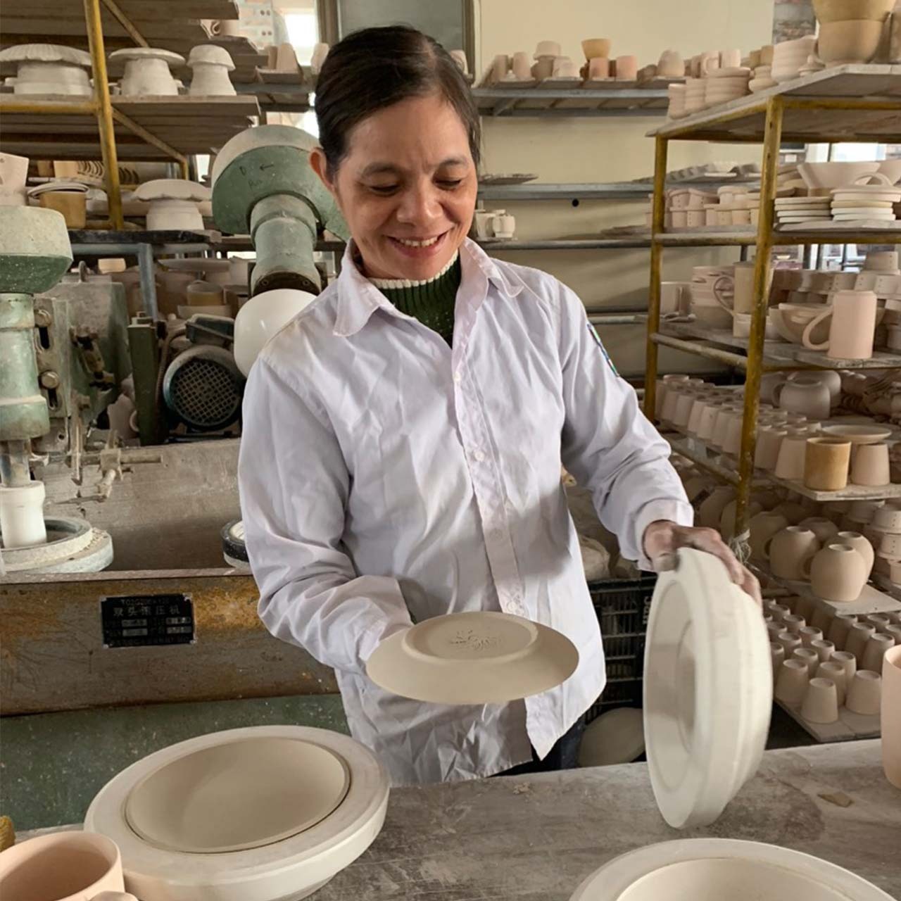 Artisan weaving a bread basket