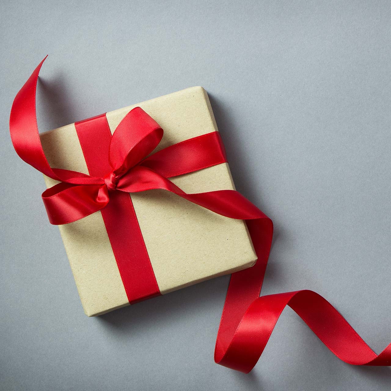 Corporate Gift with ribbon in craft paper box