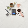 Precision pocket scale with LCD backlit display
