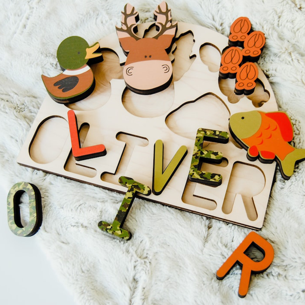 Sportsman name puzzle with deer, mallard duck and fish for kids