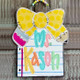 Notebook paper with pencil bow door hanger