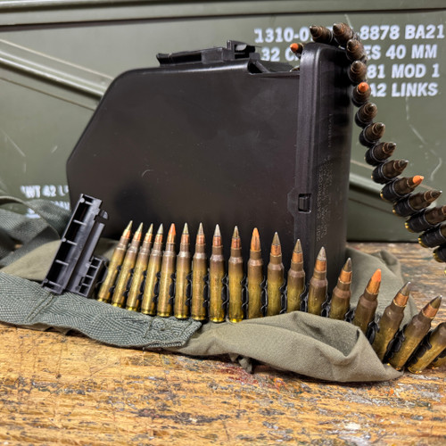 Lake City 5.56 M855A1 EPR 4:1 M856 Red Tracer in M249 SAW Pork Chop (Picture 1). Lake City 5.56 M855A1 EPR 4:1 M856 Red Tracer in M249 SAW Pork Chop (Picture 1).