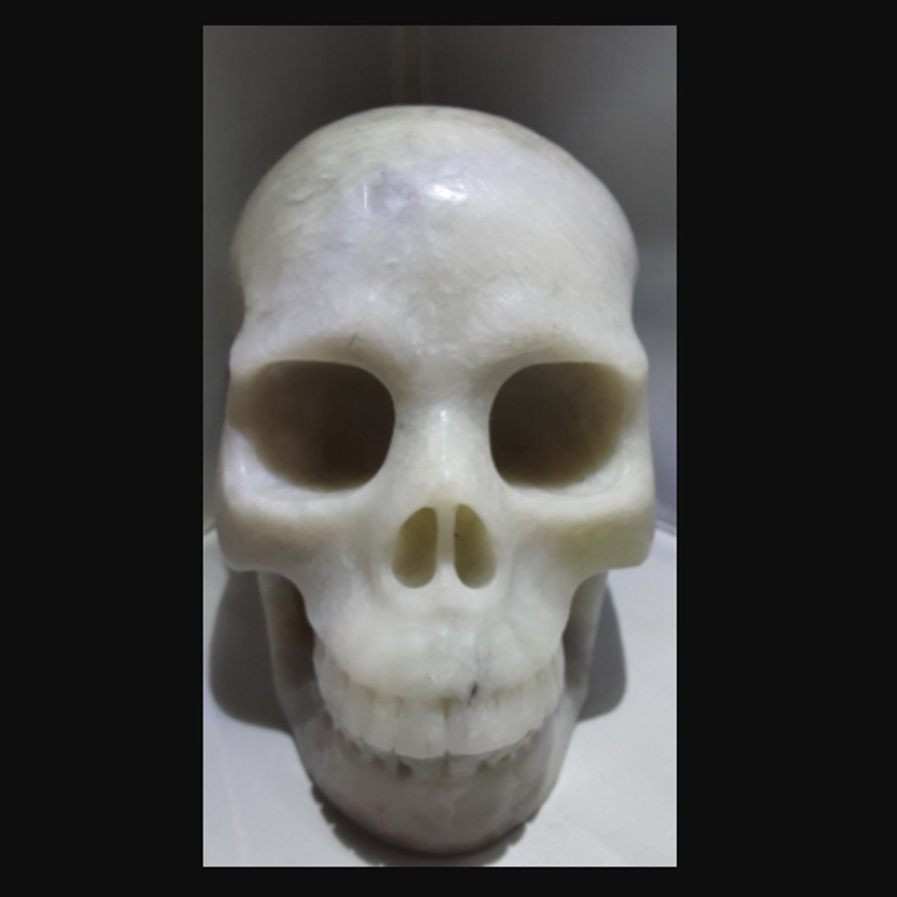 Gemstone Skull Quartz Clear w/ Tourmaline Inclusions 5" W x 4" H - 1242 g