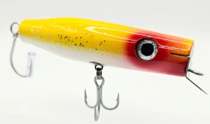 Stan Gibbs Lures Danny Pro Series 4.5-inch 1.5-ounce wooden surface swimmer plug featuring a wide metal lip, thru-wire stainless steel hardware, and saltwater treble hooks against a plain background. Yellow White Belly