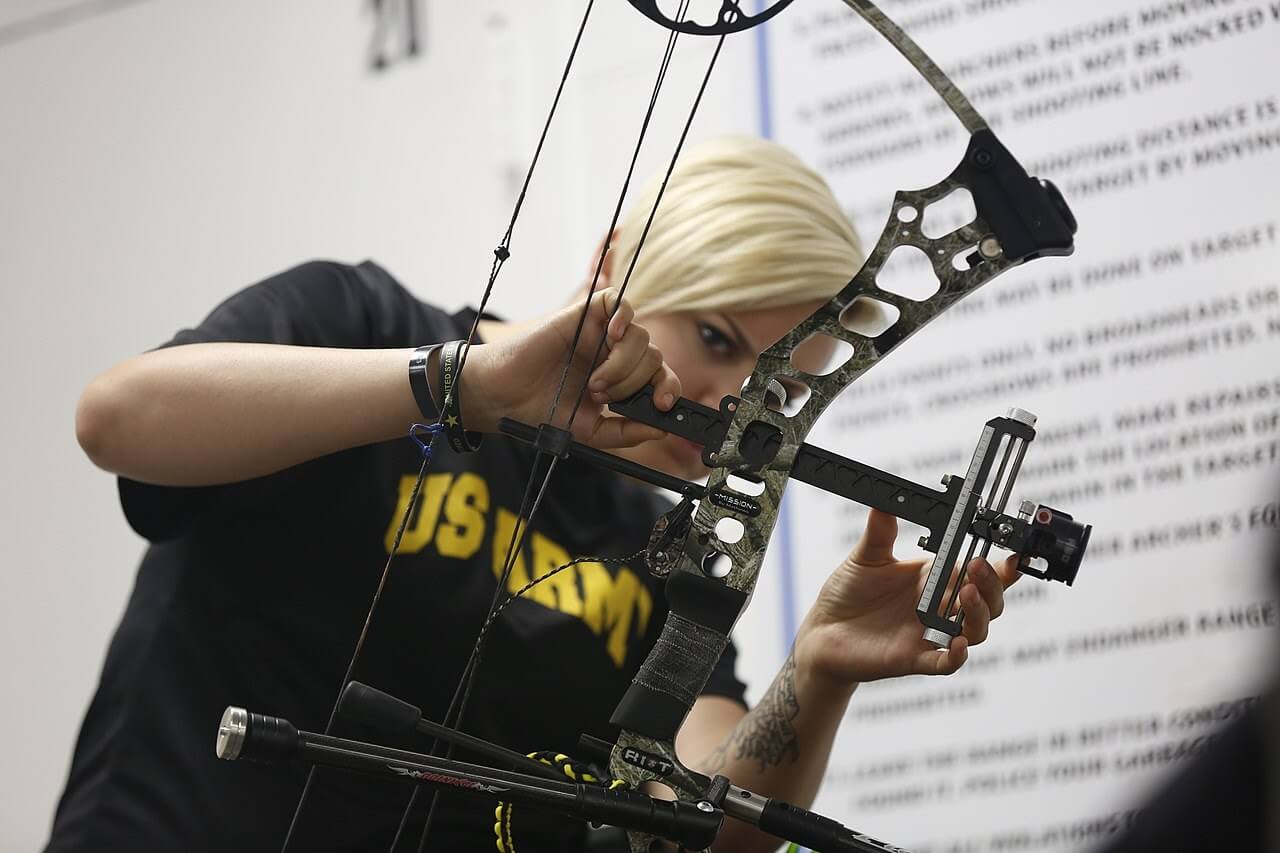 army vet installing a peep sight