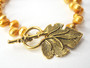 Gold Freshwater Pearl Bracelet w/ Leaf Clasp