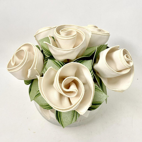 Everyday Bouquet Carole Shiber Designs,  cream-colored roses made of fabric with ARTPrints Botanic Leaf Napkin Rings.