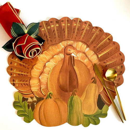 Turkey Placemat Carole Shiber Designs, autumn-themed decorative placemat with a painted turkey and pumpkins, accented with gold-colored spoons and a fabric flower.