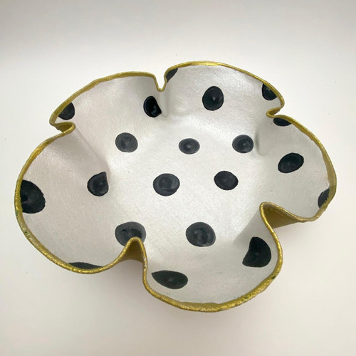 SculpTable Wired Basket - Black Polka-Dots Carole Shiber Designs, a white fabric basket shaped like a flower with black polka dots and gold trim.