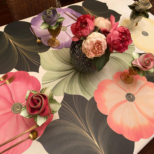 10 Placemats for 4 Seasons Carole Shiber Designs, colorful leaf-patterned placemats on a dining table with floral centerpiece and decorative napkin rings. 10 Placemats for 4 Seasons Carole Shiber Designs, colorful leaf-patterned placemats on a dining table with floral centerpiece and decorative napkin rings.