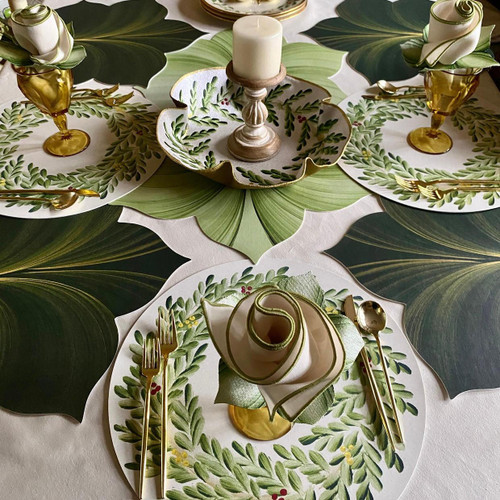 All Set for the Holidays & Beyond, festive table setting with green and gold themed dinnerware, candle, and decorative napkins for holiday celebration. All Set for the Holidays & Beyond, festive table setting with green and gold themed dinnerware, candle, and decorative napkins for holiday celebration.