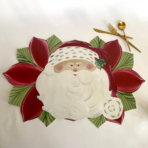 Santa Loves Poinsettias, Set of 4 Carole Shiber Designs decorative holiday platter featuring a festive Santa Claus with a holly leaf, surrounded by red and green poinsettia flower details and gold holiday cutlery.