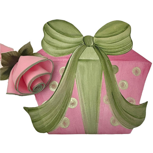 Giftbox Placemat - Pink with Green Bow Carole Shiber Designs, featuring a pink gift box with polka dots and a large green ribbon bow, styled as a decorative placemat. Giftbox Placemat - Pink with Green Bow Carole Shiber Designs, featuring a pink gift box with polka dots and a large green ribbon bow, styled as a decorative placemat.