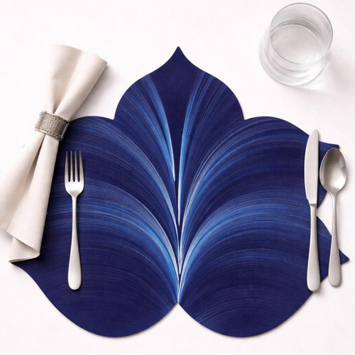 5 Point Fountain Leaf - Dark Blue Carole Shiber Designs, decorative blue leaf-shaped placemat on a table with utensils and glass of water