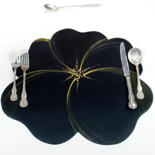 Buttercup Placemat - Black/Gold Carole Shiber Designs, elegant black and gold flower-shaped placemat with silver cutlery on a white background.