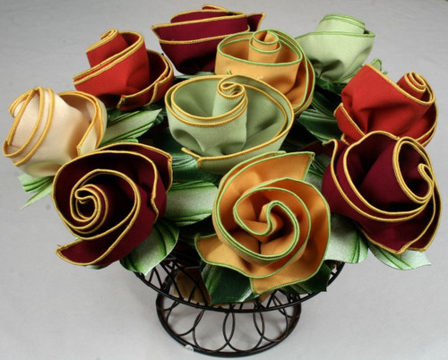 The Gratitude Napkin Bouquet by Carole Shiber Designs: edged no-iron napkins rolled up into hand-painted linen leafy ring-to-coasters.