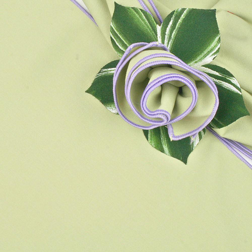 HoneyDew with Lilac Trim Napkin Carole Shiber Designs, decorative fabric napkin with a lilac trim styled with green leaves and a lilac spiral embellishment. HoneyDew with Lilac Trim Napkin Carole Shiber Designs, decorative fabric napkin with a lilac trim styled with green leaves and a lilac spiral embellishment.