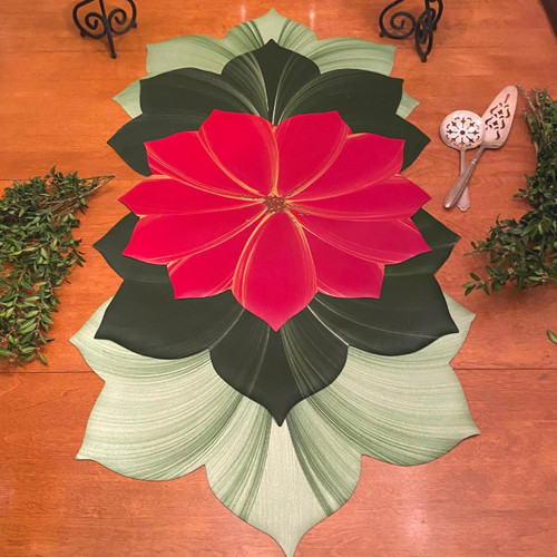 5-Pc Leaves & Poinsettia Setting Carole Shiber Designs, a festive holiday table centerpiece with red Poinsettia flower surrounded by large green and black leaves, on a wooden table with greenery and silver utensils. 5-Pc Leaves & Poinsettia Setting Carole Shiber Designs, a festive holiday table centerpiece with red Poinsettia flower surrounded by large green and black leaves, on a wooden table with greenery and silver utensils.