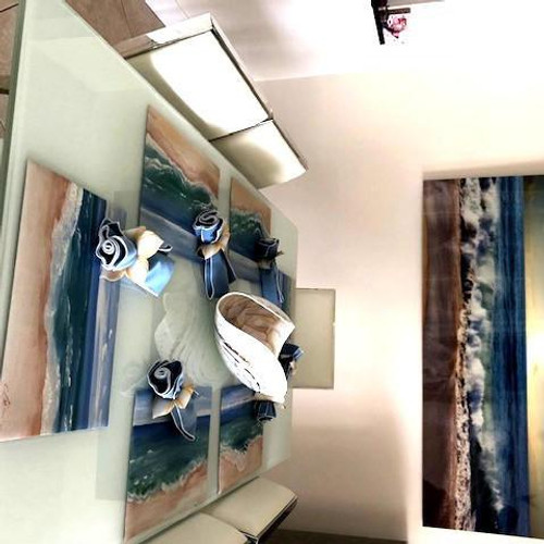 Custom Seascape Tablescape Carole Shiber Designs, an elegant table setting featuring ocean-themed artwork and coordinated tableware items.
