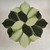 Hosta Leaf Placemat - Mint, an eco-friendly placemat featuring a mint green and dark green leafy design by Carole Shiber Designs.