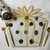 Party Placemat, Black Dots w Gold Carole Shiber Designs, decorative party table setting with black dotted and gold accents, gold cutlery, and a wine glass. Party Placemat, Black Dots w Gold Carole Shiber Designs, decorative party table setting with black dotted and gold accents, gold cutlery, and a wine glass.
