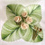Palm Leaf Placemat by Carole Shiber Designs, green and white tropical leaf pattern with cream-colored decorative roses and gold cutlery.