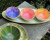 Entertainer's Tray & Bowls 4-Piece Set, 3 colorful pansy melamine bowls on a decorative melamine leaf tray. Dishwasher-safe.