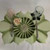 Double Leaf Setting/Centerpiece, an elegant decorative table centerpiece with a layered leaf design and a floral accent. Double Leaf Setting/Centerpiece, an elegant decorative table centerpiece with a layered leaf design and a floral accent.