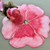 Add a Party Pansy - Pink Placemat Carole Shiber Designs, decorative pink pansy-shaped placemat with a realistic floral design and a rolled pink flower embellishment.