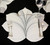 7 Point Leaf - White/Silver Carole Shiber Designs, elegant table setting with white leaf-shaped placemat, silver utensils, and glassware.