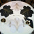 7 Point Leaf - White/Gold & Silver Carole Shiber Designs, intricately designed table centerpiece with large black, white, and gold leaves on a white tablecloth. 7 Point Leaf - White/Gold & Silver Carole Shiber Designs, intricately designed table centerpiece with large black, white, and gold leaves on a white tablecloth.