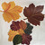 Autumn Leaves 3-Pc. Centerpiece, decorative artificial autumn leaf cutouts in vibrant fall colors like yellow, orange, red, brown, and green for seasonal home decor.