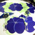Buttercup Placemat - Dark Blue, floral design with green leaves by Carole Shiber Designs on a table setting.