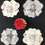 Grey & Buttercream Buttercups 4 Set Carole Shiber Designs, elegant table place settings with buttercup-shaped placemats, gold cutlery, and folded napkins with ribbon accents, arranged around a floral centerpiece. Grey & Buttercream Buttercups 4 Set Carole Shiber Designs, elegant table place settings with buttercup-shaped placemats, gold cutlery, and folded napkins with ribbon accents, arranged around a floral centerpiece.