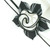 White with Black Trim Napkin Carole Shiber Designs, elegant white napkin decorated with a black trim flower embellishment.