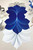Deep Blue/White & White/Silver, Set of 4 Carole Shiber Designs table placemats, displayed as a layered floral pattern.