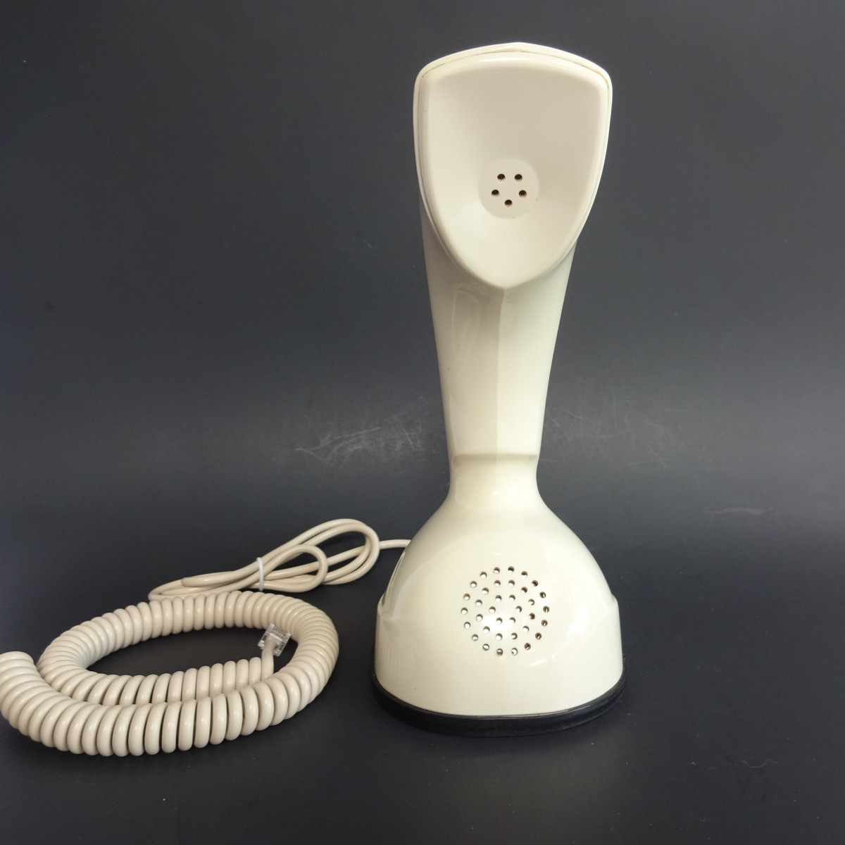 Pink Ericofon telephone is a fully working phone that looks very