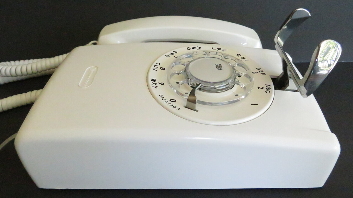 Western Electric White 554 rotary dial wall telephone | Old Phone Shop
