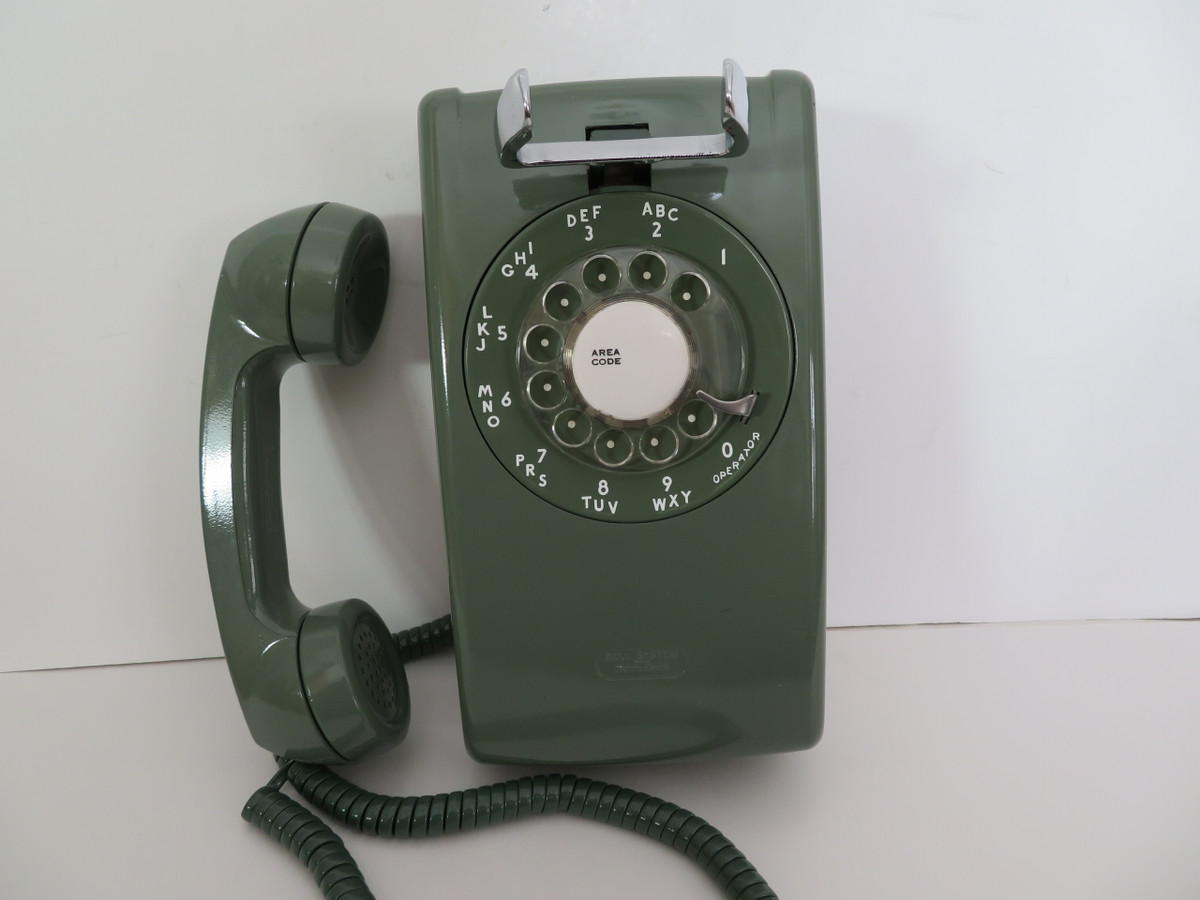 Green rotary telephone made by Western Electric