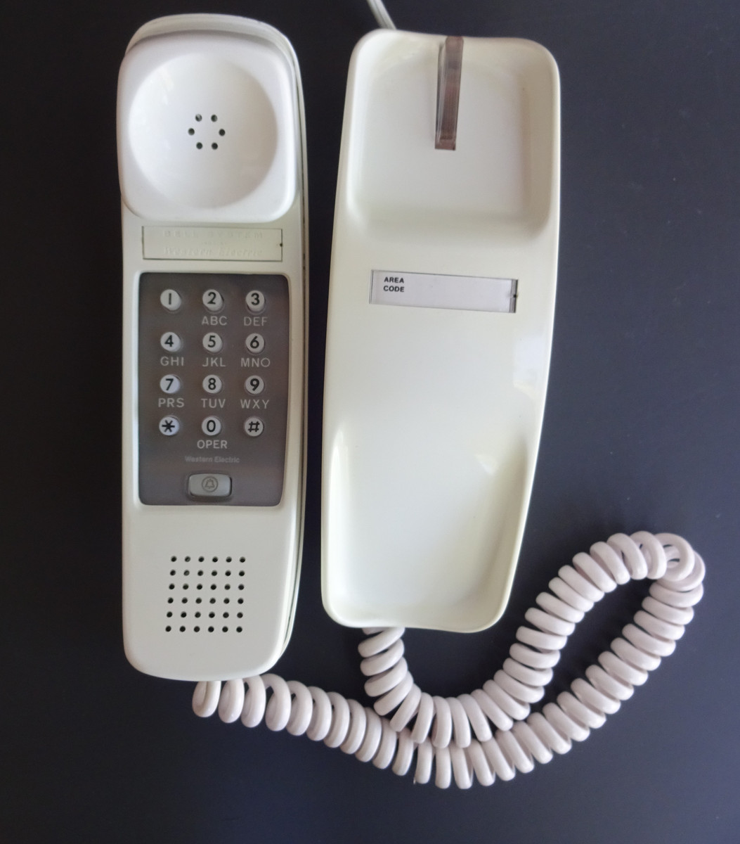 Western Electric Yellow trimline wall telephone | Old Phone Shop