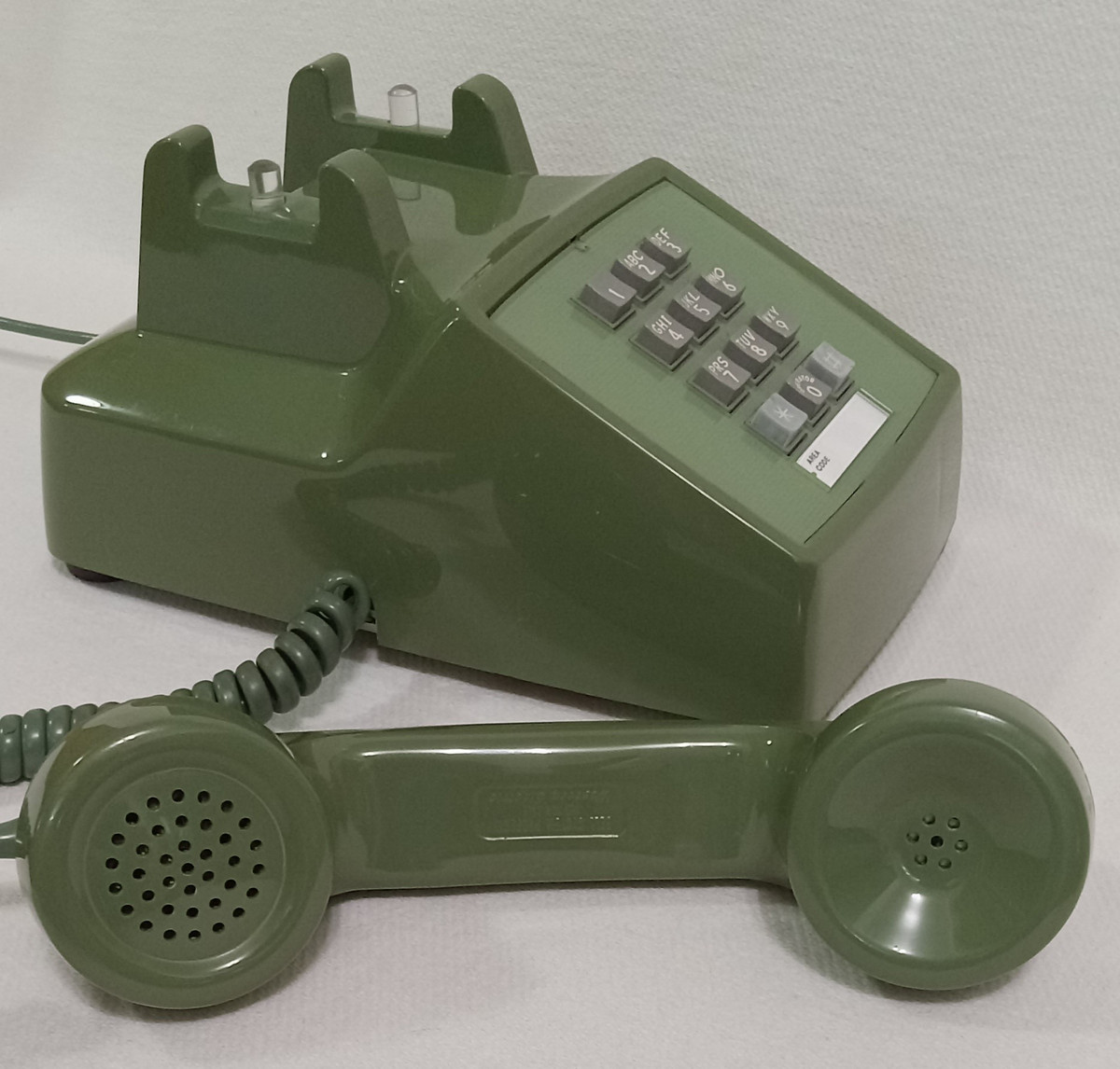 Moss Green 2500 telephone is made by Western Electric and has a