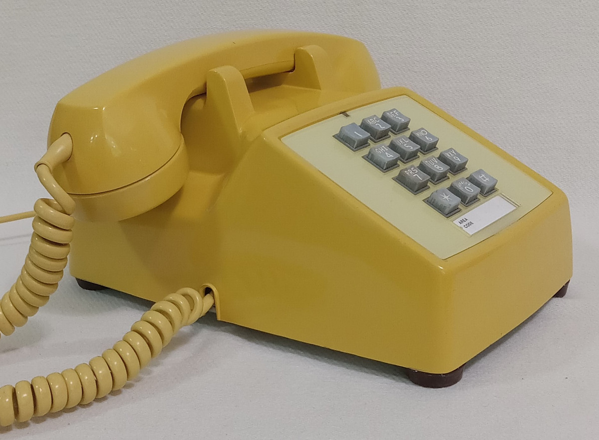 Western Electric 2500 series touchtone telephone in Yellow| Old